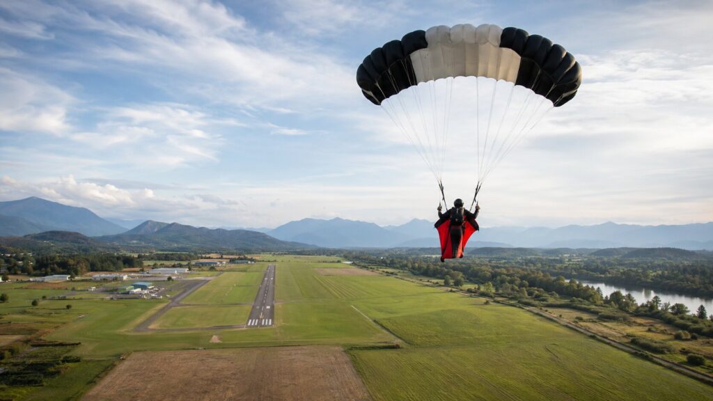 vol sous parachute wingsuit